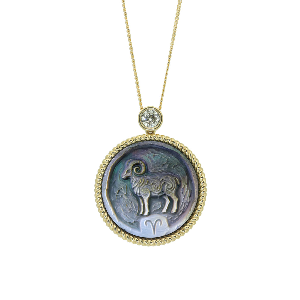 Aries zodiac pendant necklace with Van Gogh inspired impasto carving on black and white natural mother-of-pearl inlay with gold plated sterling silver chain by OceanCarvingLab.