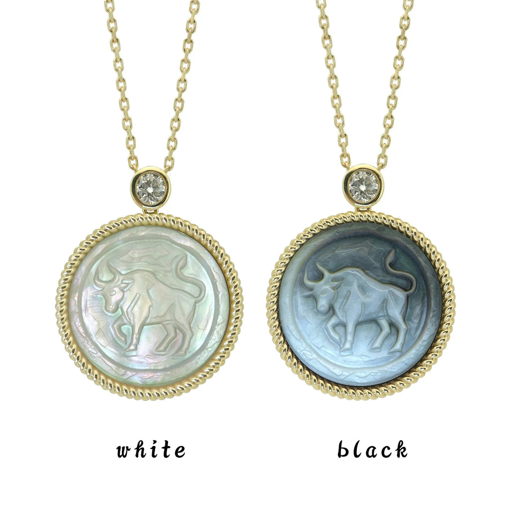 Taurus zodiac relief pendant necklace carved with primitive stone texture in black and white mother-of-pearl by OceanCarvingLab.