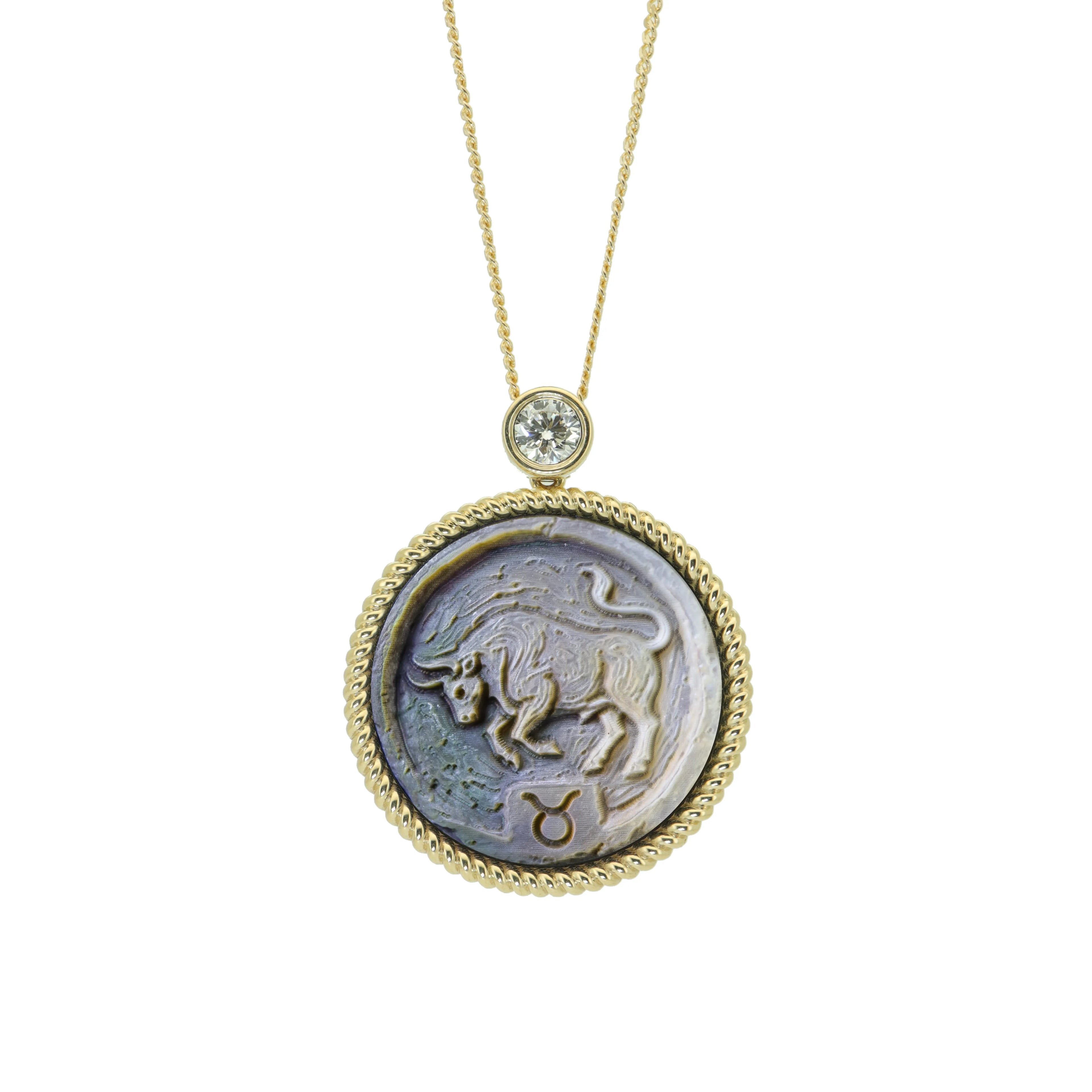 Taurus zodiac pendant necklace featuring Van Gogh inspired impasto shell carving on natural mother-of-pearl with gold plated sterling silver chain by OceanCarvingLab.