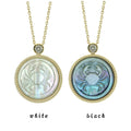 Cancer zodiac pendant necklace with raw archaeological inspired carving and iridescent mother-of-pearl relief by OceanCarvingLab.