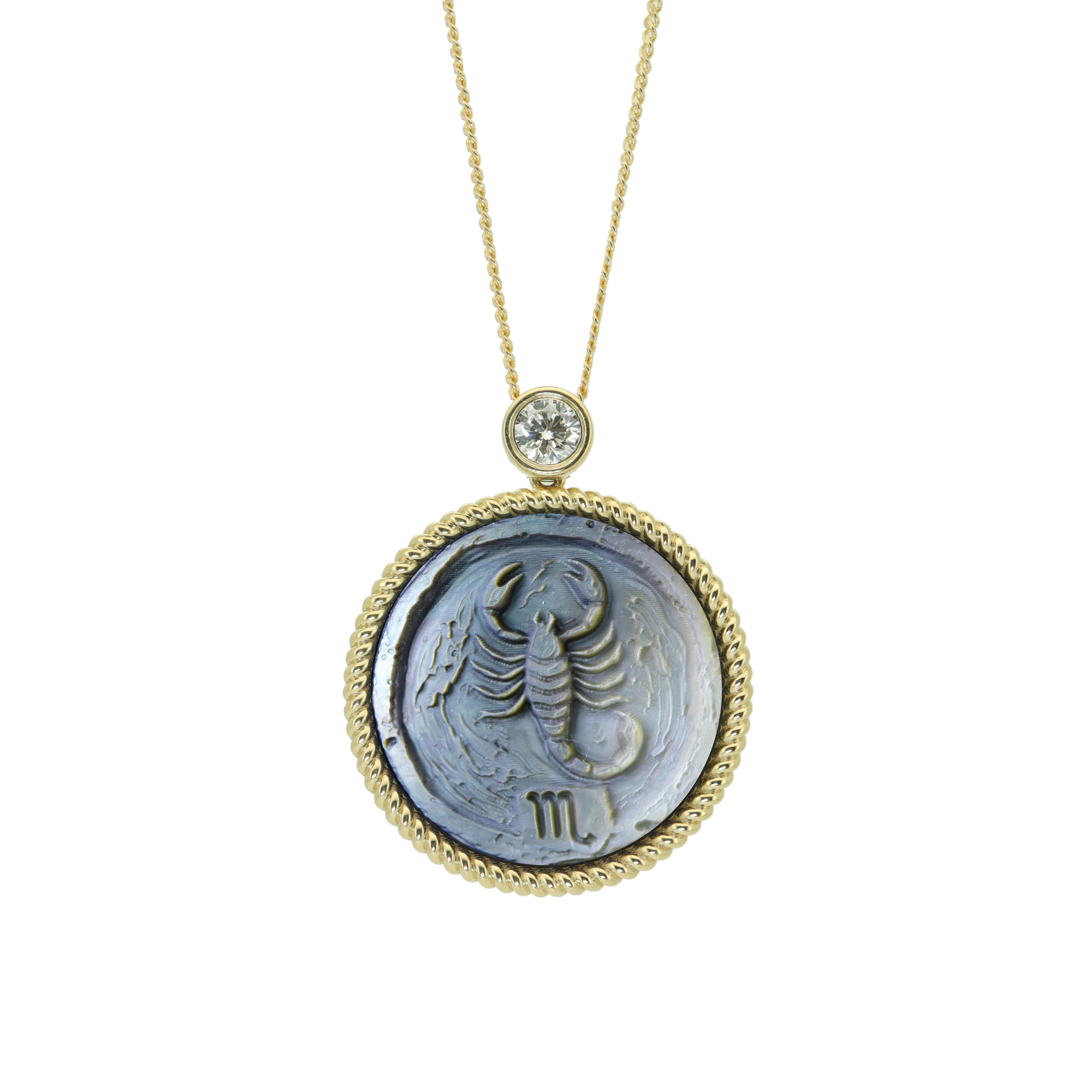 Scorpio astrology necklace featuring artistic impasto carved mother-of-pearl zodiac pendant with gold plated sterling silver chain by OceanCarvingLab.