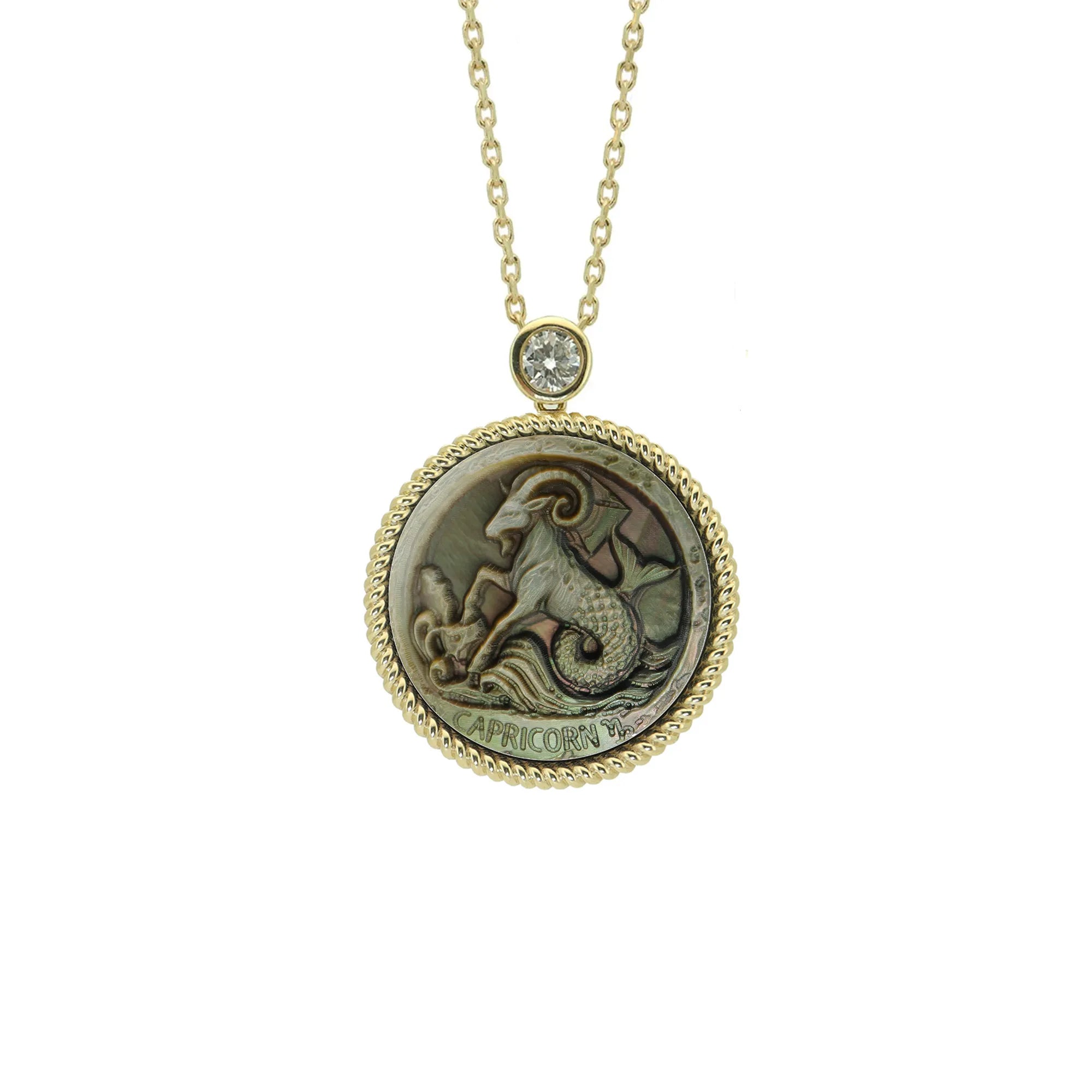 Modern abstract Capricorn zodiac necklace featuring Picasso-inspired celestial carving and gold plated sterling silver pendant by OceanCarvingLab.