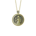 Abstract Virgo zodiac necklace featuring sculptural constellation carving and iridescent mother-of-pearl surface by OceanCarvingLab.
