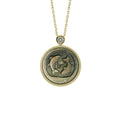 Dreamlike Pisces zodiac necklace featuring abstract artistic carving on iridescent natural mother-of-pearl pendant by OceanCarvingLab.