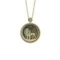 Modernist Leo zodiac pendant necklace with expressive abstract lines carved into natural mother-of-pearl shell by OceanCarvingLab.