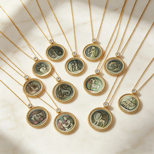 Picasso-inspired abstract zodiac necklace collection featuring 12 constellation designs carved in natural iridescent mother-of-pearl relief by OceanCarvingLab.