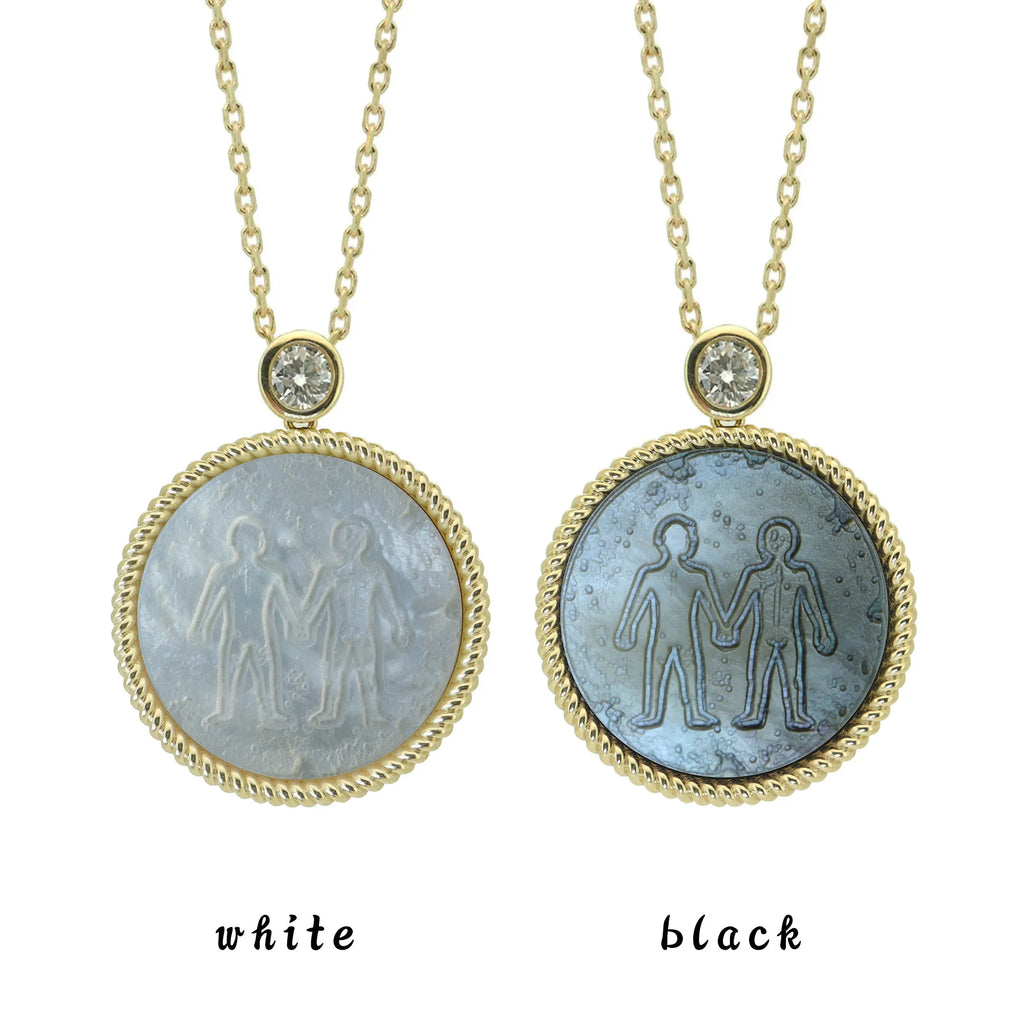 wo Gemini zodiac pendant necklaces with carved black and white mother-of-pearl inlay on white background by Celestial Creations.