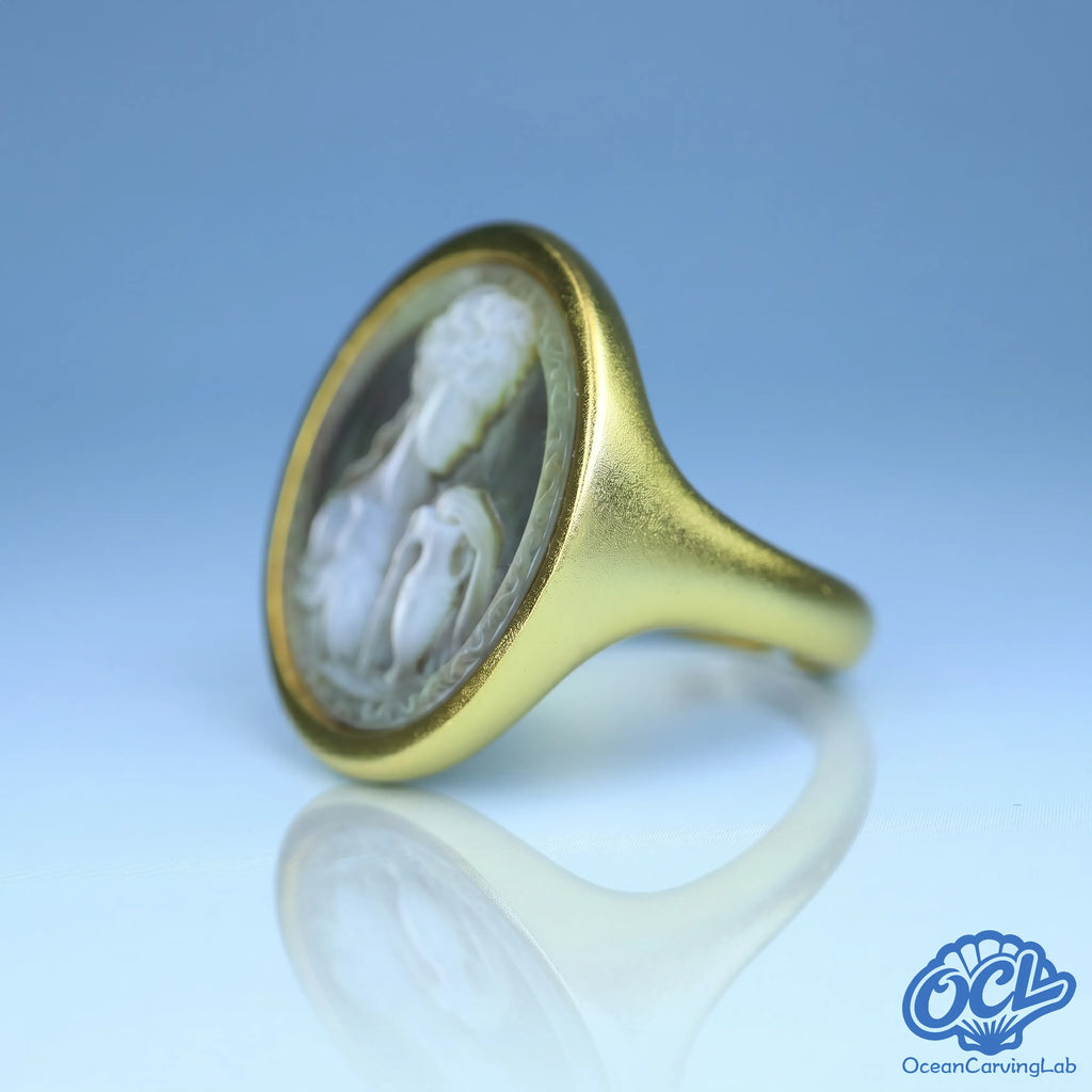 Unique Aquarius symbol engraved on iridescent white shell disc using advanced CNC technology.