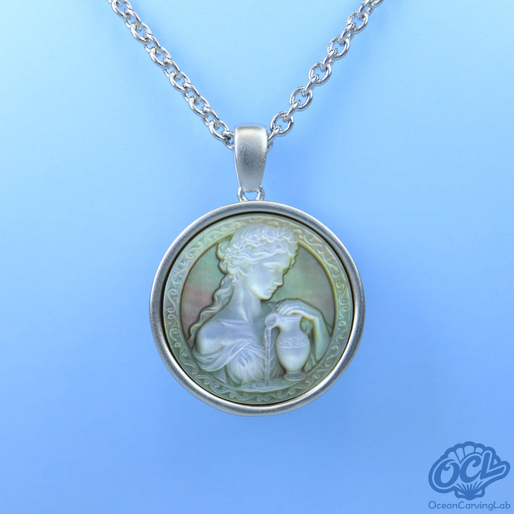 Detailed Aquarius constellation engraved on iridescent black nacre for a mysterious look.