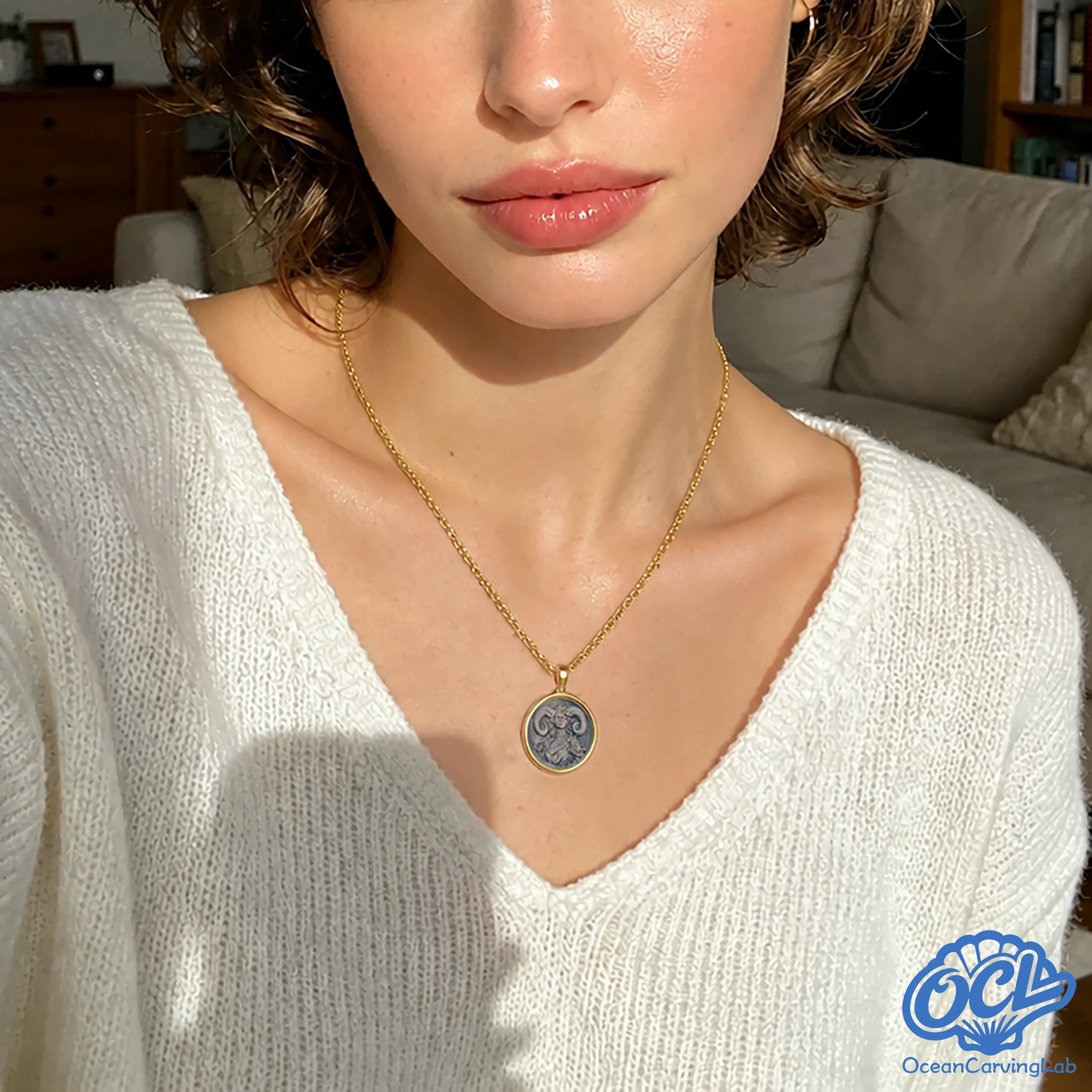 Layered zodiac necklace featuring a white shell Aries charm and high-luster gold plating.