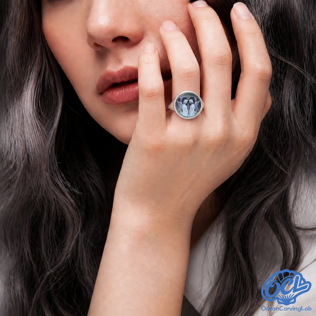 Profile view of Gemini ring showing the seamless transition from gold plating to shell.