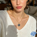 Layered Leo zodiac necklace showcasing the majestic lion charm and gold luster.