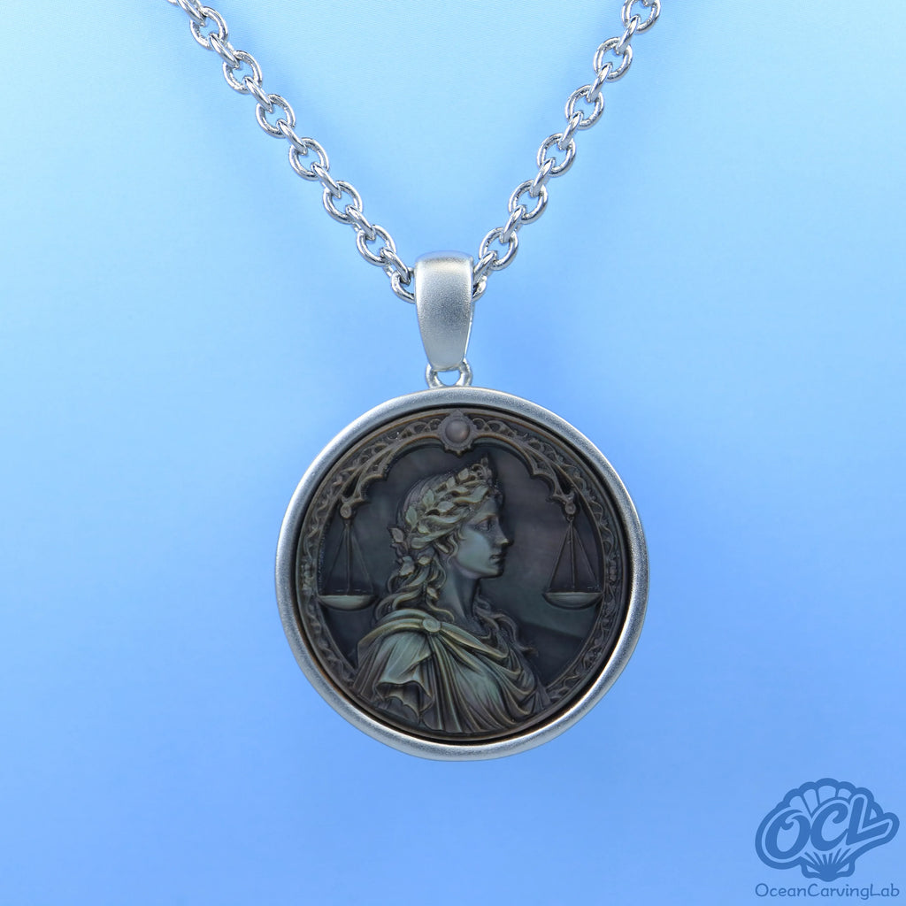 Intricate Libra constellation engraved on black iridescent mother of pearl for a starry look.