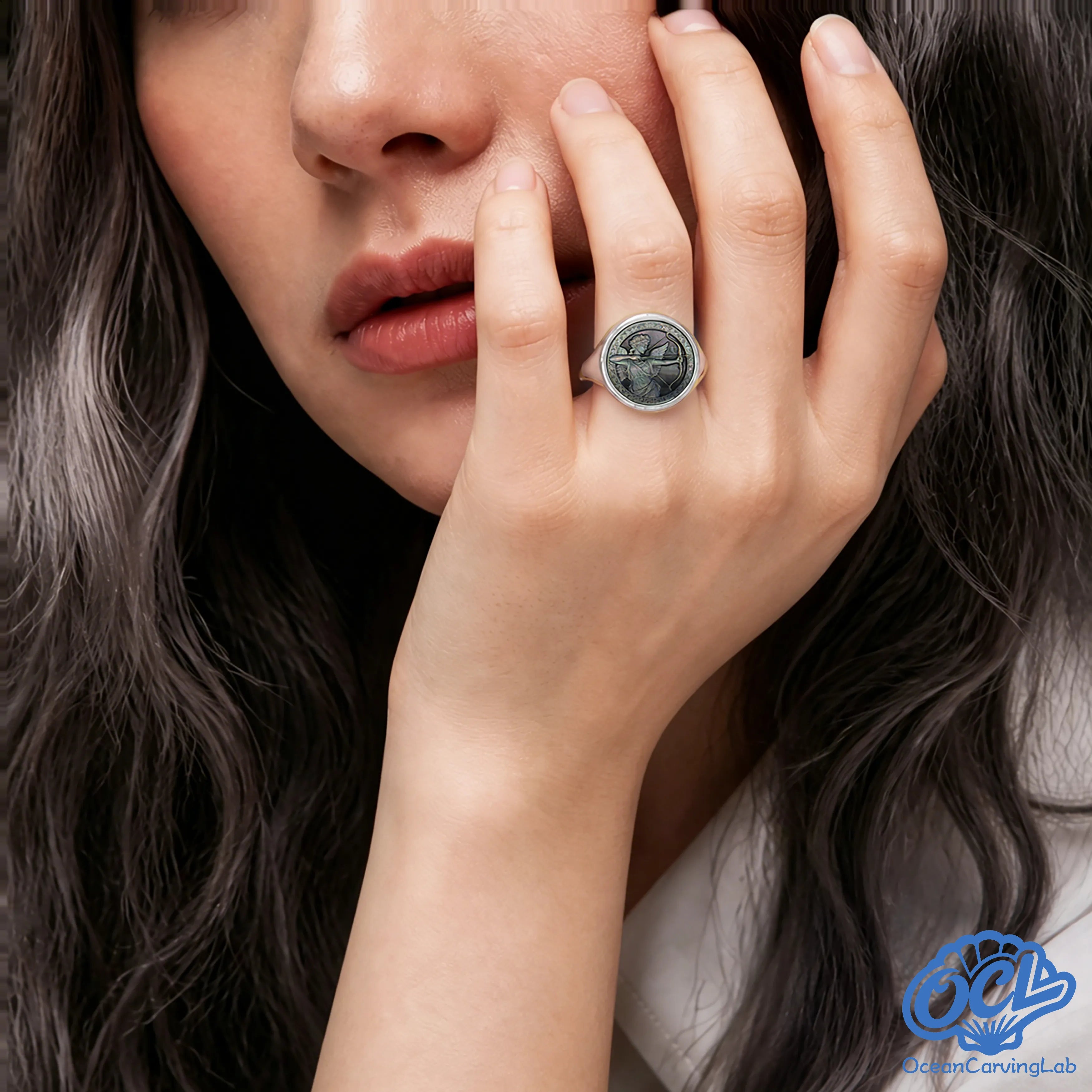 Bold Sagittarius statement ring on a finger, perfect for free-spirited and modern style.
