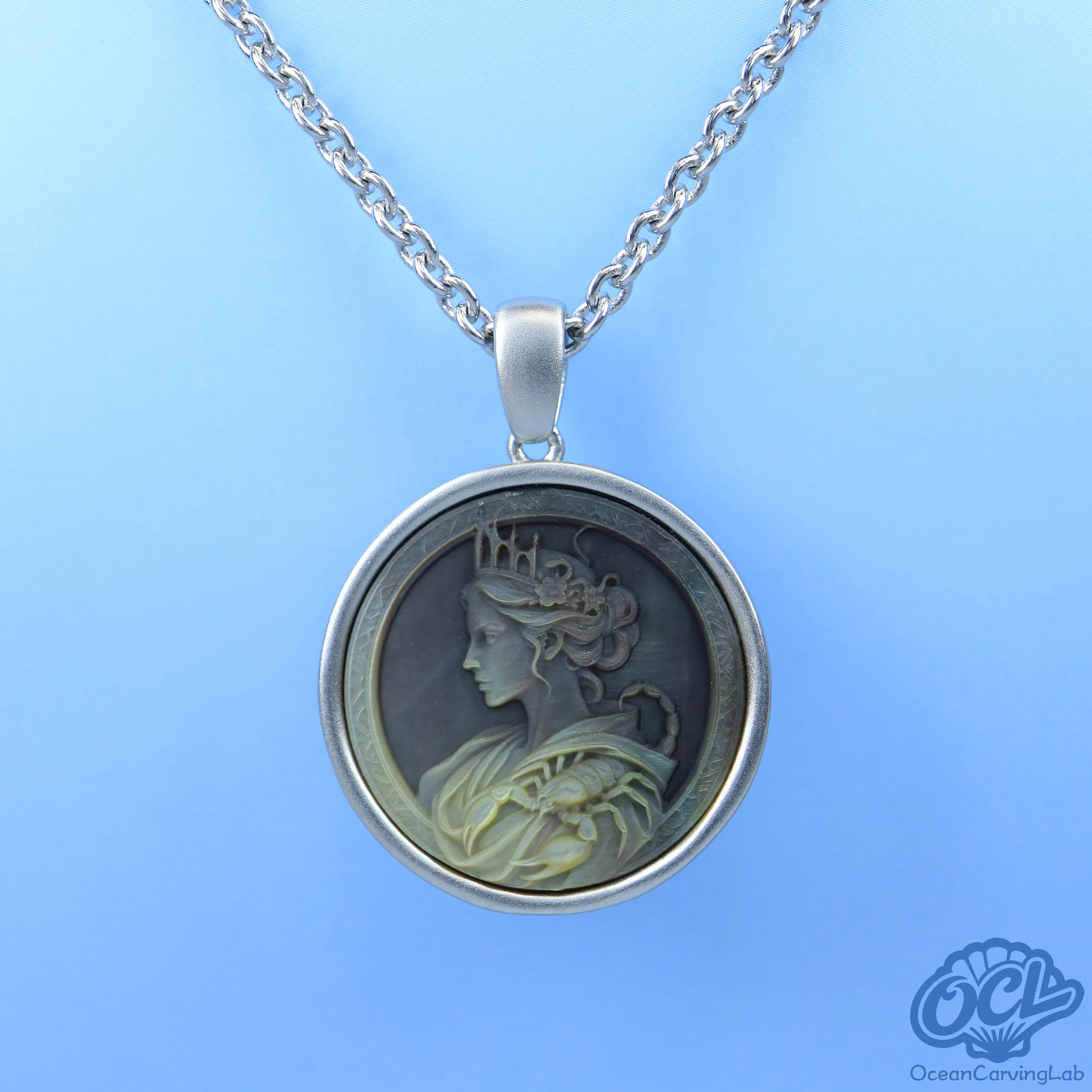 Scorpio constellation figure engraved on white iridescent mother of pearl for a soft glow.