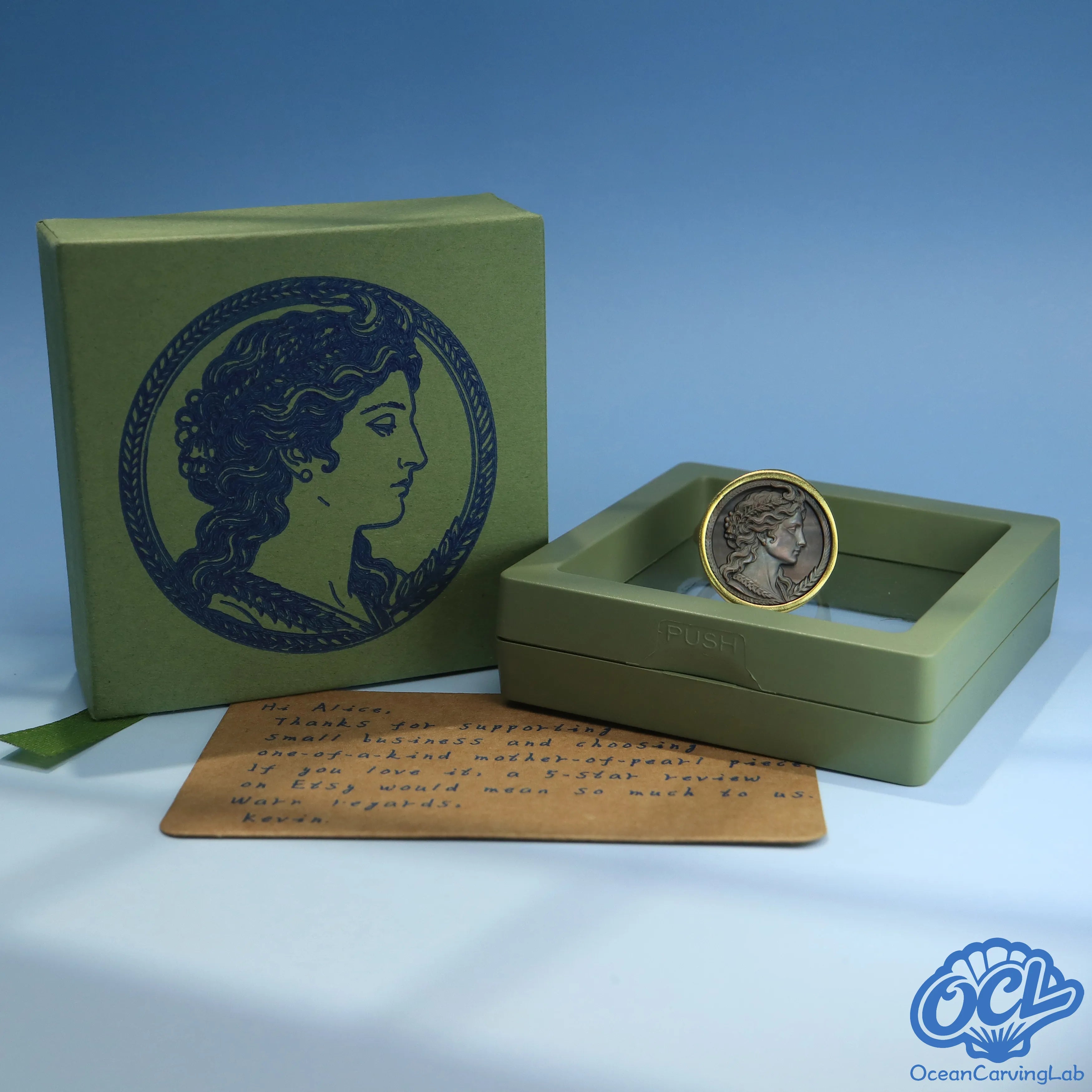 Detailed CNC 3D modeling of the Taurus symbol on a natural mother of pearl disc.
