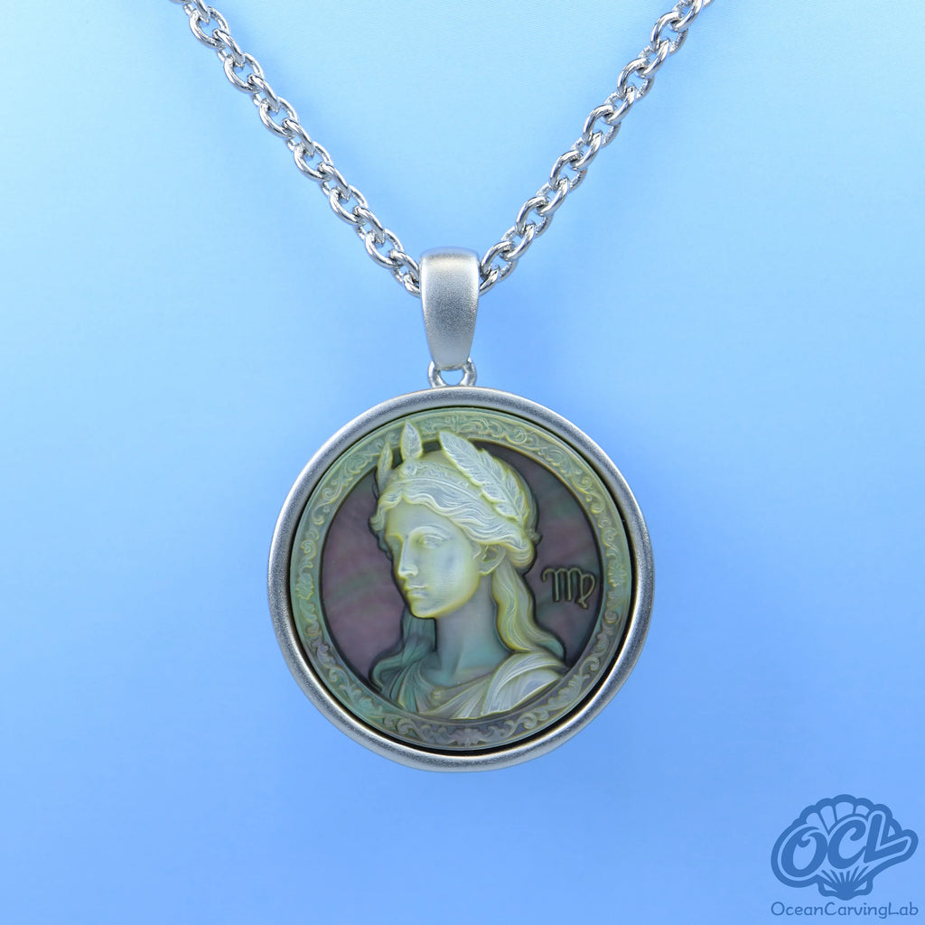 Detailed Virgo maiden engraving on iridescent black shell disc using high-precision CNC.
