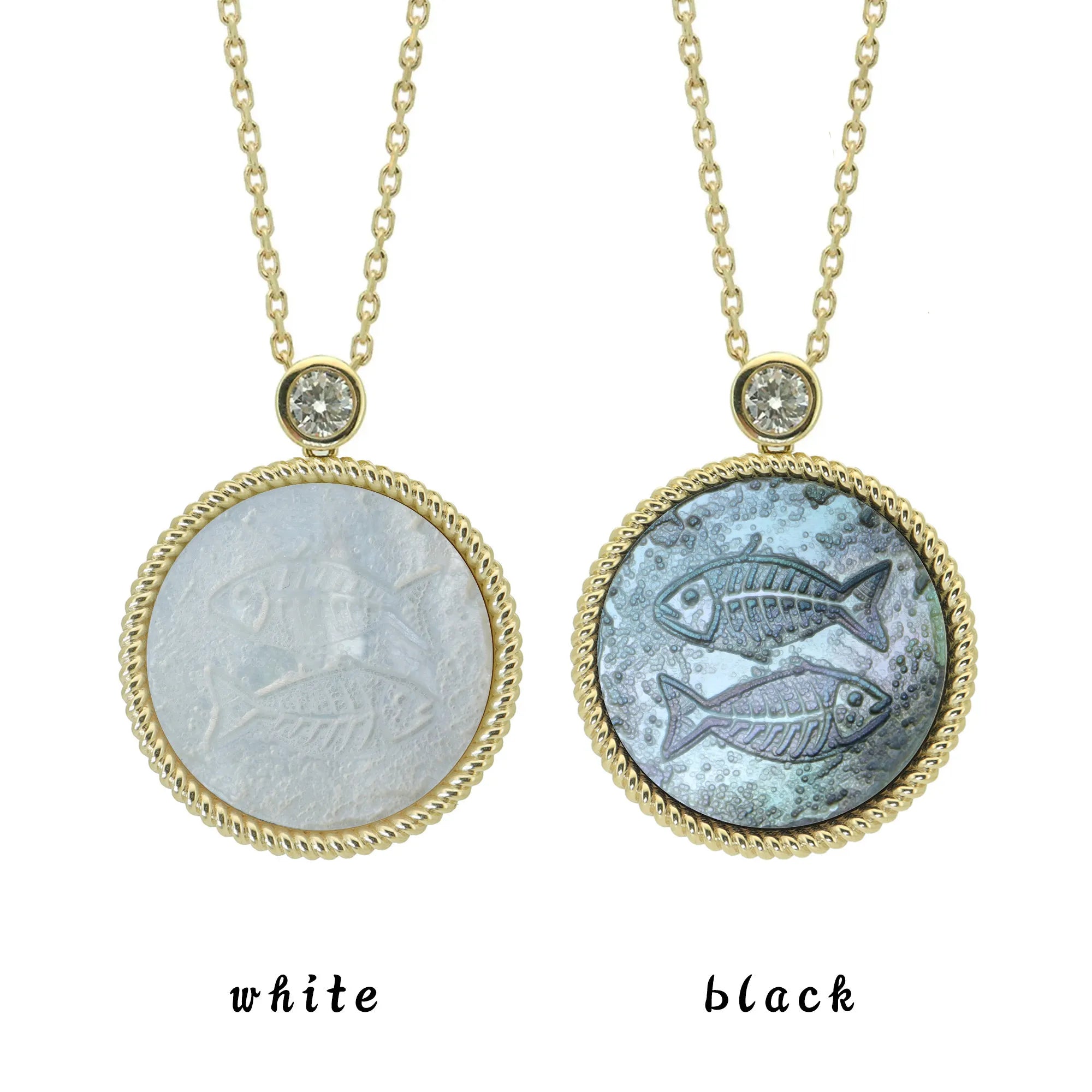 Two Pisces zodiac pendant necklaces with carved black and white mother-of-pearl inlay on white background by Celestial Creations.